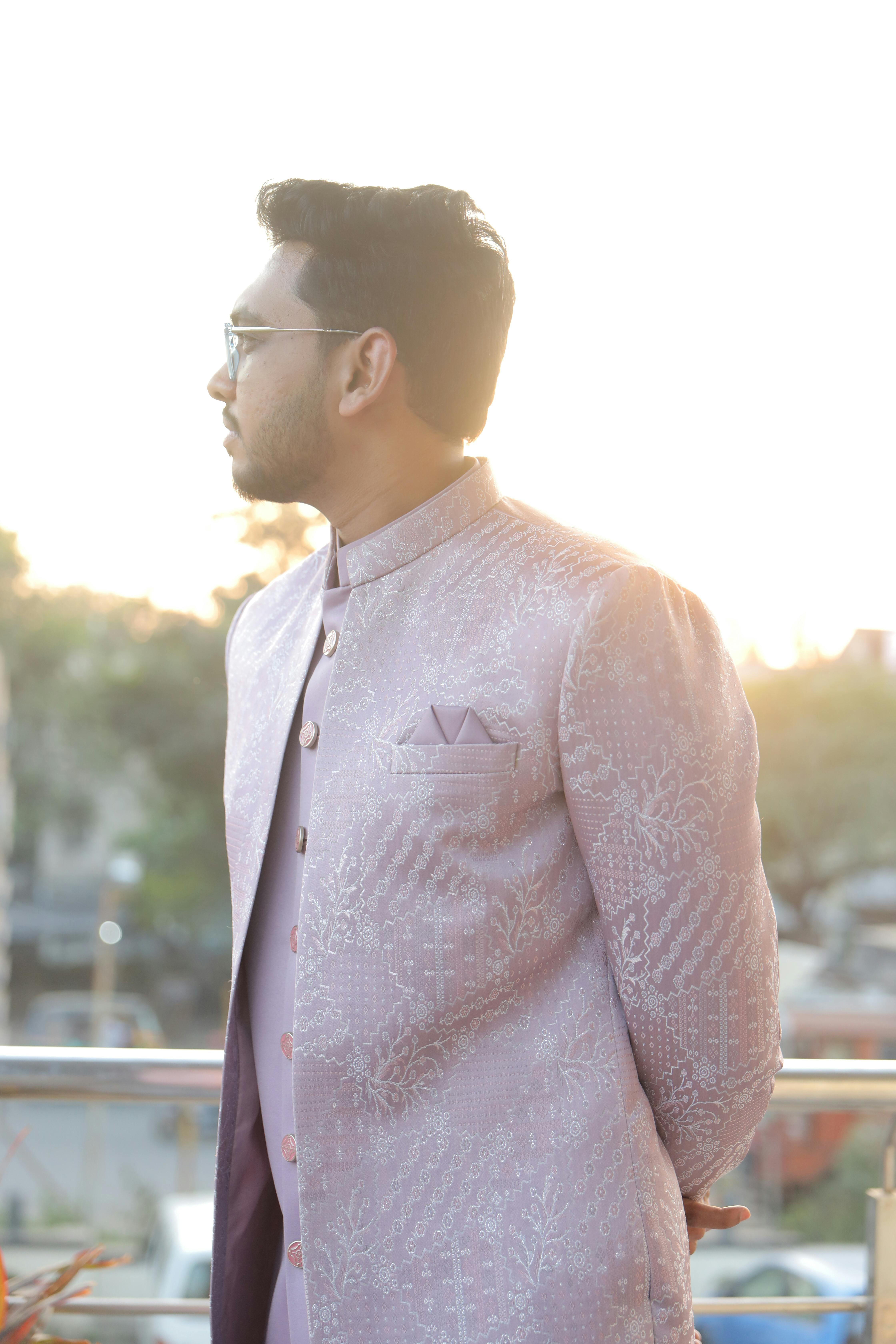Man in traditional pink sherwani