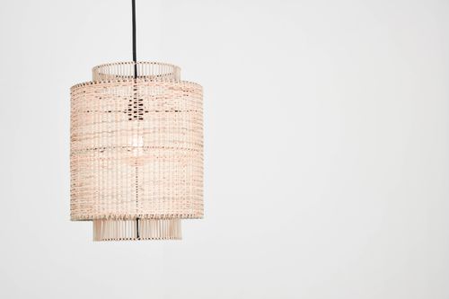 Free Elegant rattan pendant lamp with woven design against a stark white backdrop, perfect for interior decor inspiration. Stock Photo