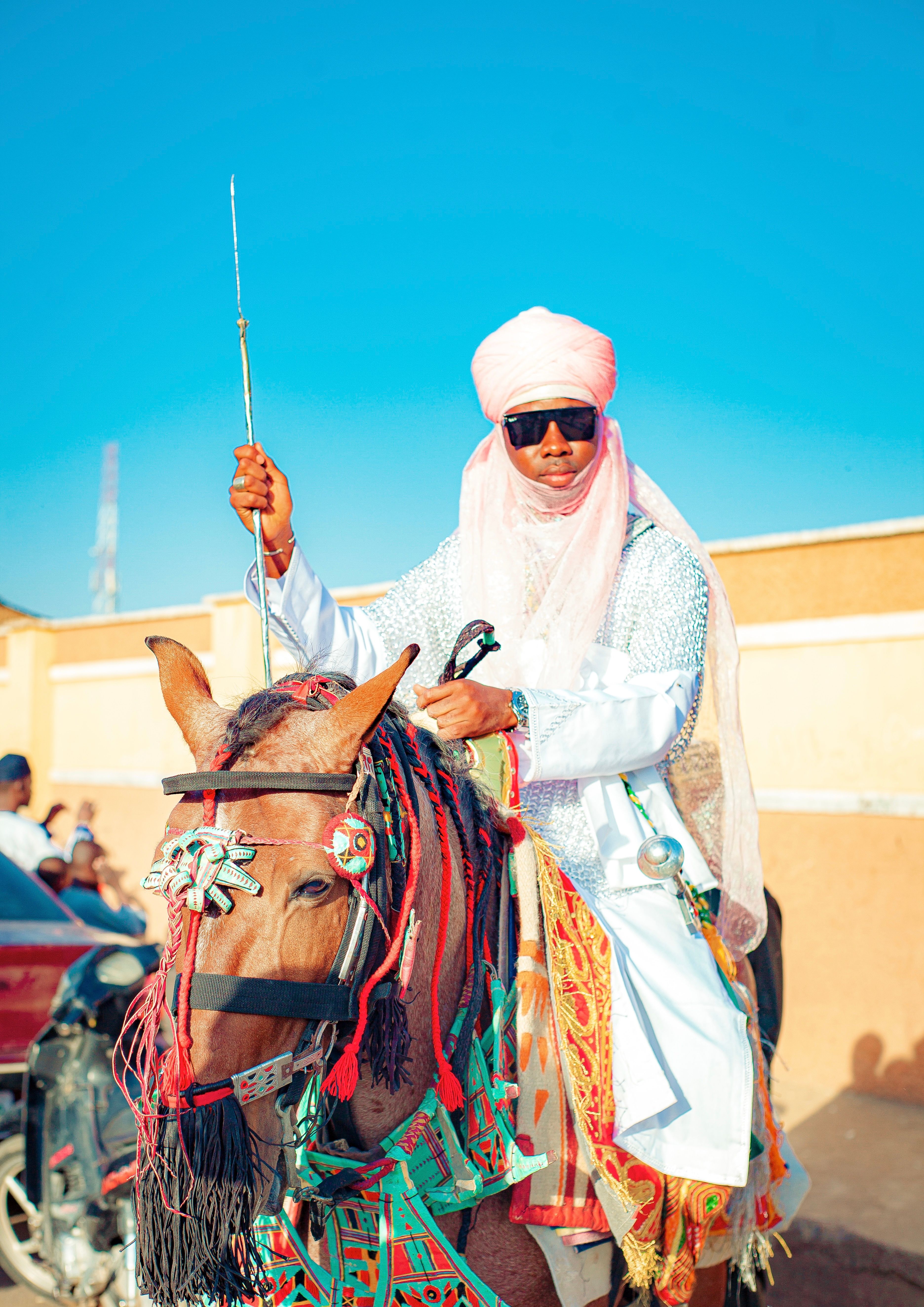 Traditional Rider in Vibrant Attire on Adorned Horse · Free Stock Photo