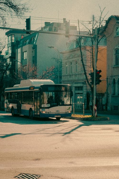 Free Urban scene with a city bus at an intersection in Varna, Bulgaria. Stock Photo