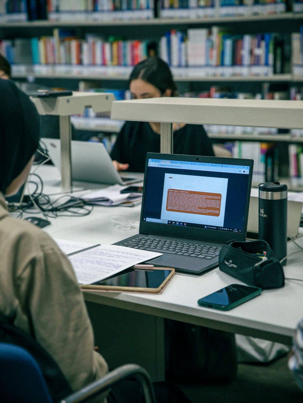 Students studying with laptops