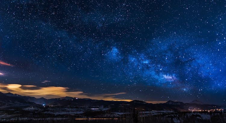 Black Mountains Under The Stars At Nighttime