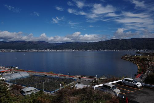 Free Breathtaking view of Lake Suwa with dramatic skies and mountainous backdrop in Nagano, Japan. Stock Photo