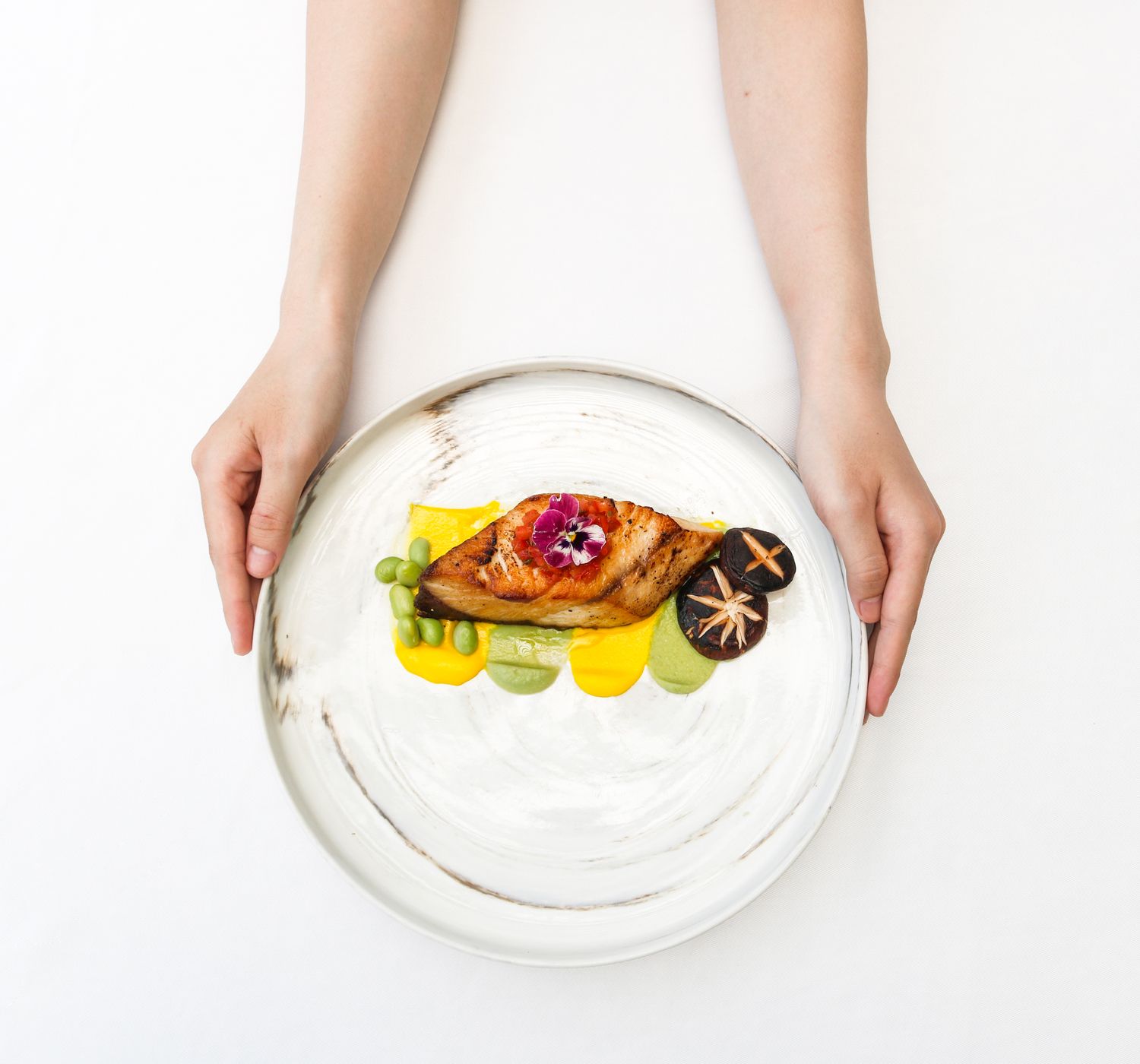 Gourmet plated dish at Emberline