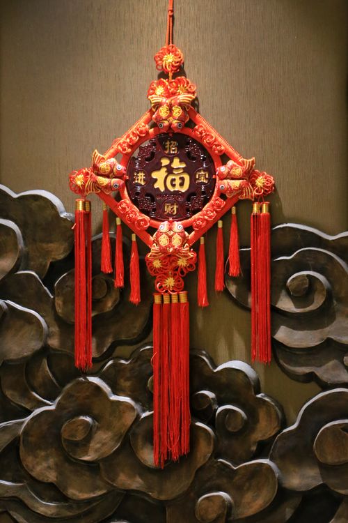 Free Colorful Chinese New Year wall hanging with intricate patterns. Stock Photo
