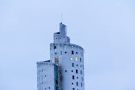 Unique Spiral Tower with Cloudy Winter Sky