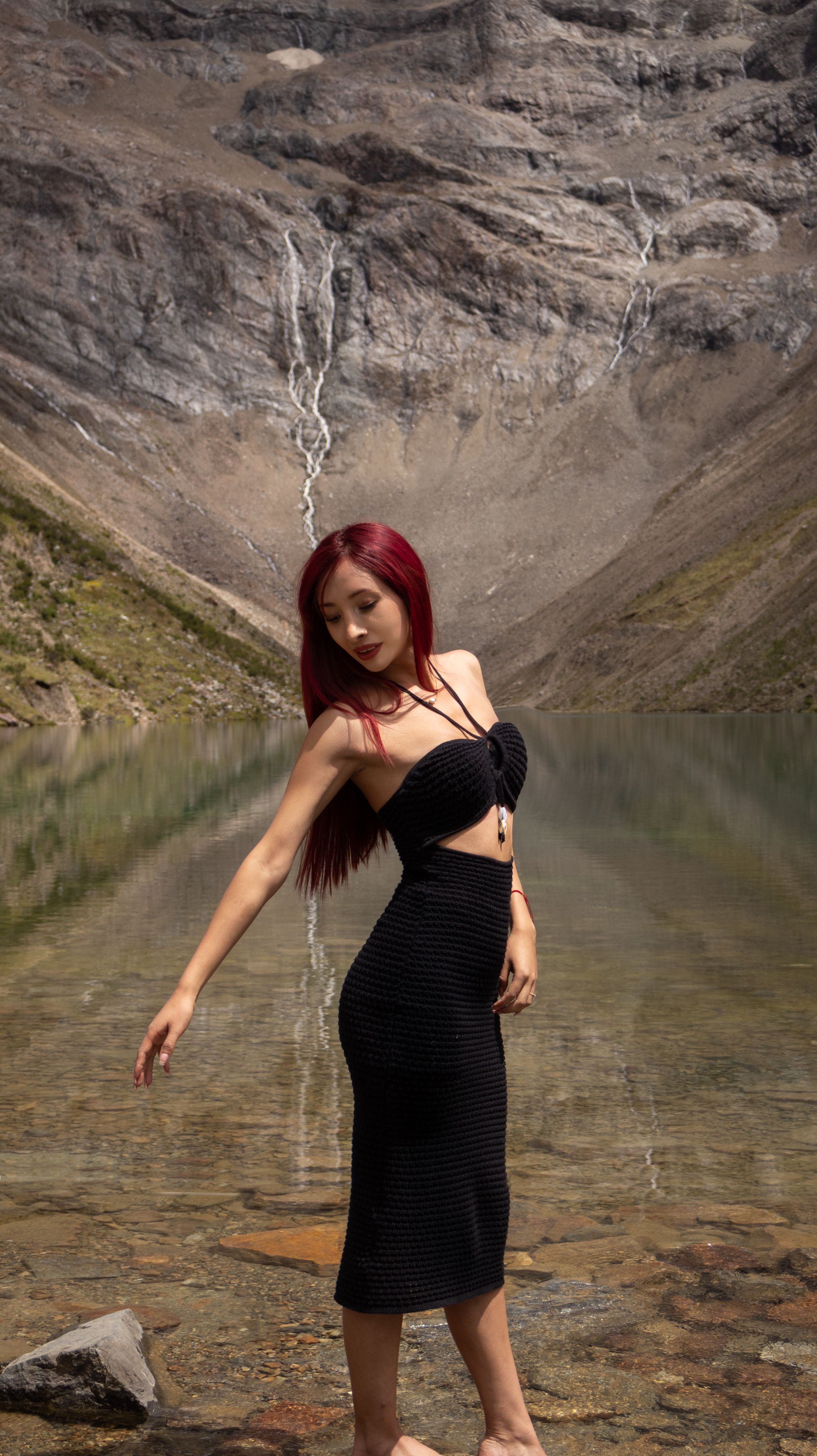 Fashionable Woman Posing by a Mountain Lake · Free Stock Photo