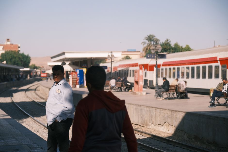 A modern Egyptian National Railways train arriving at Luxor station