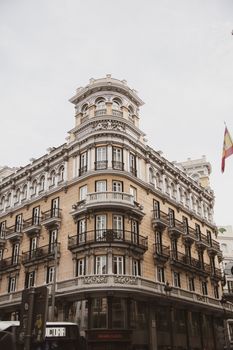 Elegant historic building in Madrid with classic architectural design and ornate details.