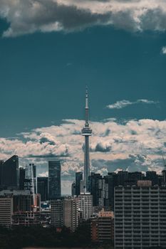 Breathtaking view of Toronto's skyline with the iconic CN Tower under a dynamic sky.