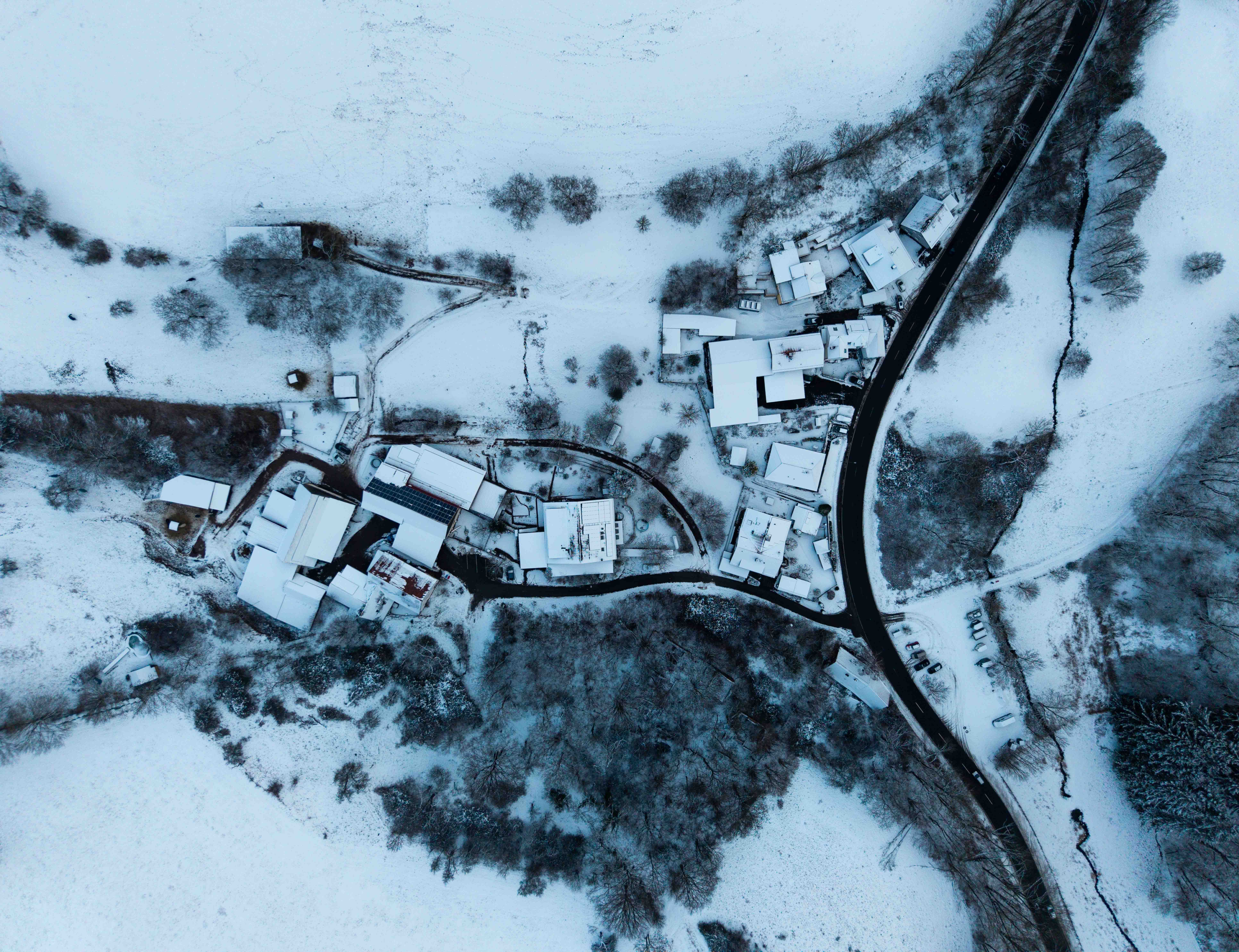 Aerial Winter Landscape of Snowy Village · Free Stock Photo