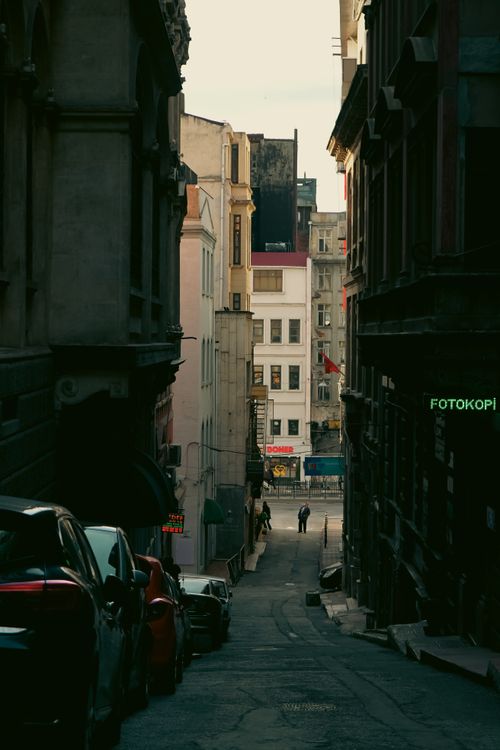 Free Explore a narrow alleyway in Istanbul with historic architecture and urban charm. Stock Photo