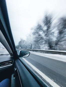 Experience a scenic winter drive in Eskişehir, Turkey with snow-covered landscapes and a clear road ahead.