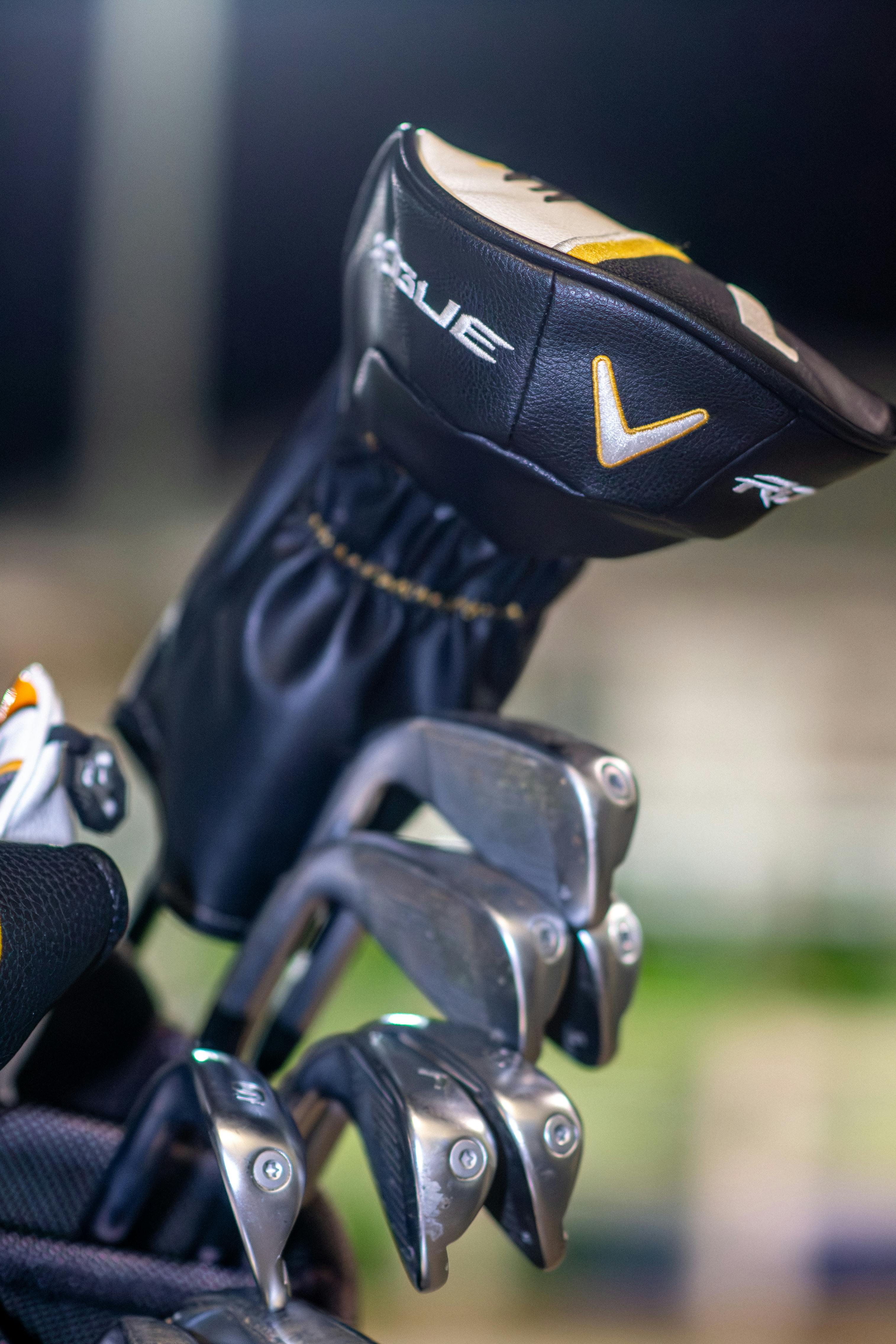 Close-up of golf clubs in a bag at a driving range in Mesa, Arizona.