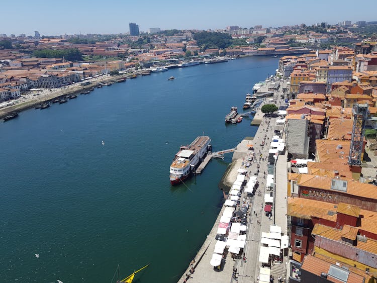 A Cruise Ship Docked On Port  