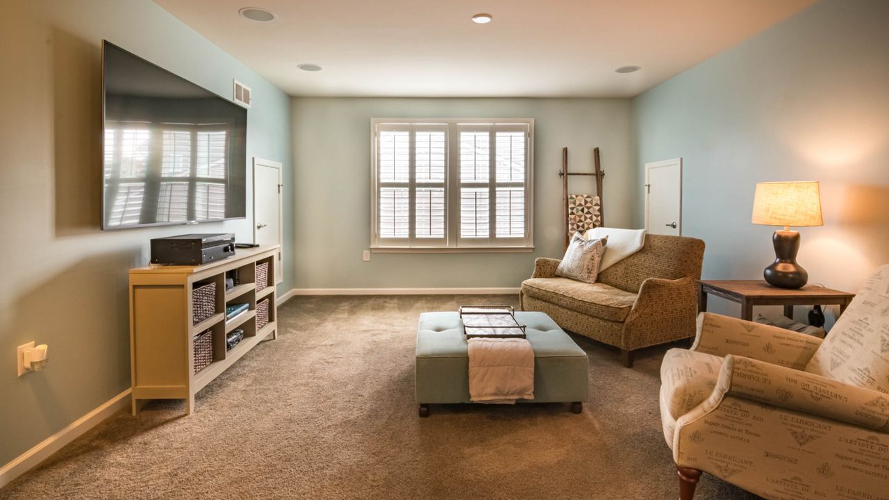 Comfortable shared urban living area Comfortable apartment common area representing affordable urban co living