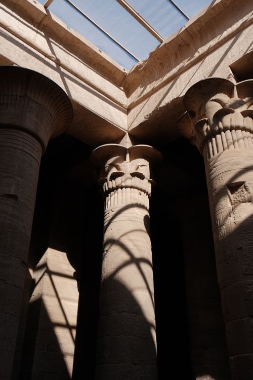 Ancient Temple Columns with Dramatic Shadows · Free Stock Photo