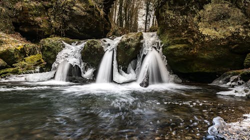 Free Body of Water Beside Rock Stock Photo