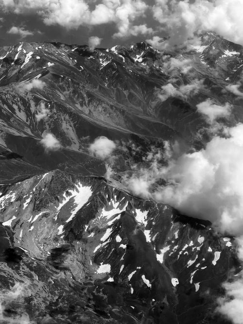 Free Breathtaking black and white aerial photo capturing the majestic Himalayan mountain range. Stock Photo