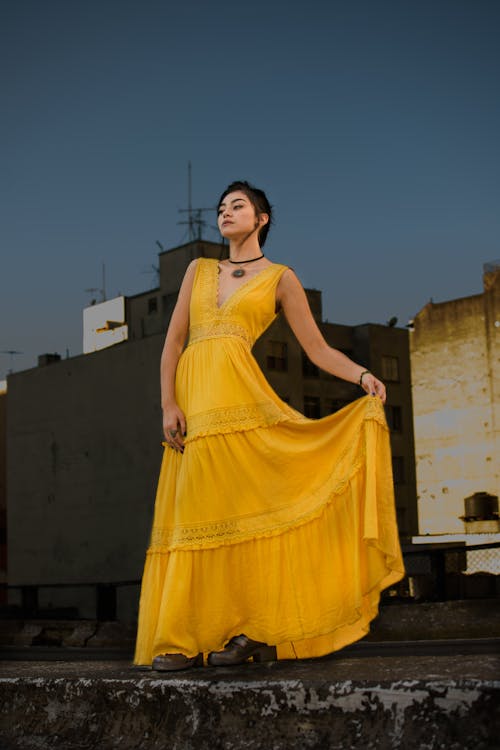 Photo of Woman Wearing Yellow Dress