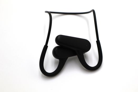 Modern black wireless headphones designed for comfort and style, ideal for digital audio experiences.