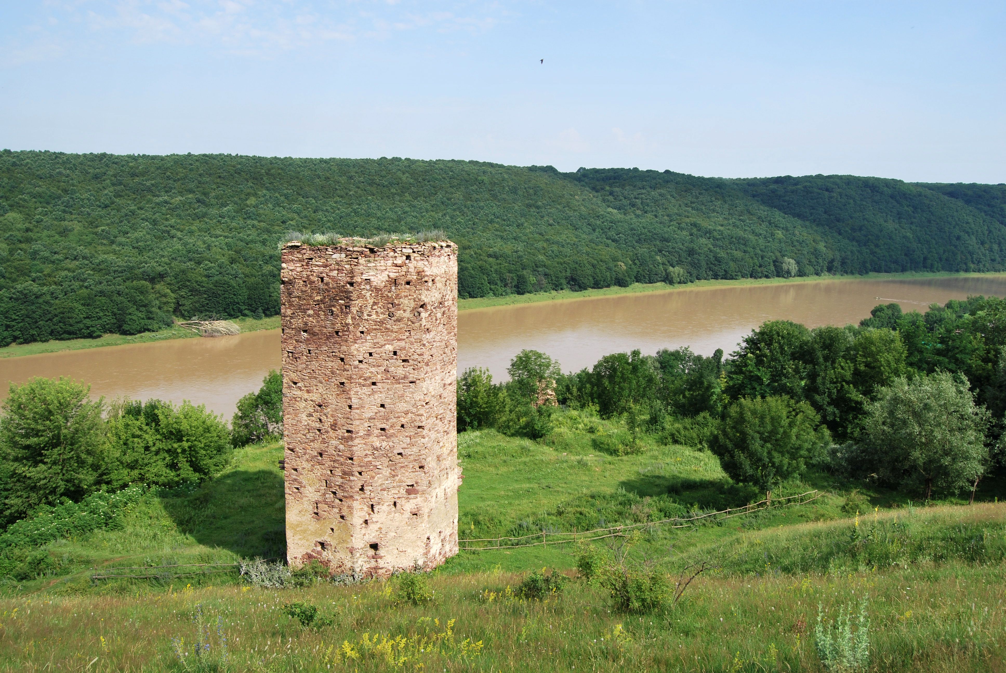 Historic Brick Watchtower by Riverside Landscape · Free Stock Photo