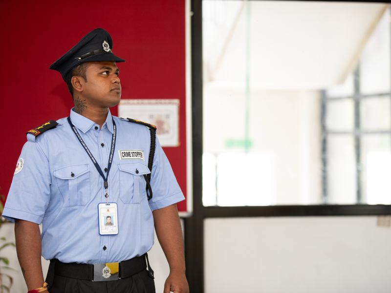 Security personnel on duty at a building entrance