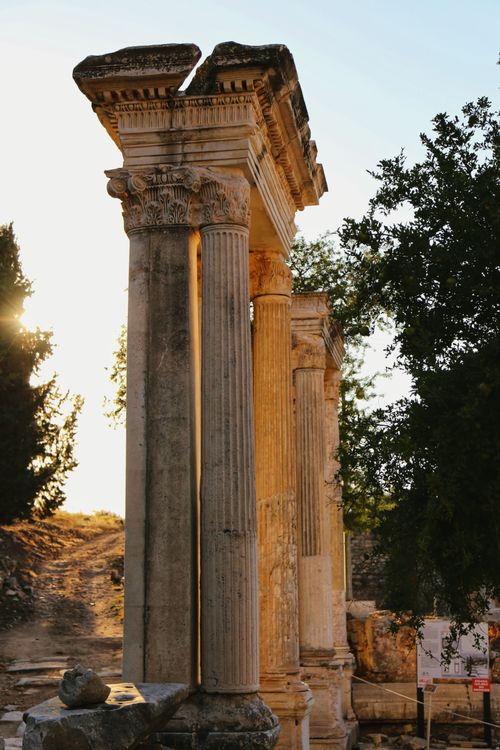 Free Ancient Roman columns in İzmir, Türkiye, captured during a beautiful sunset, exemplifying classical architecture. Stock Photo