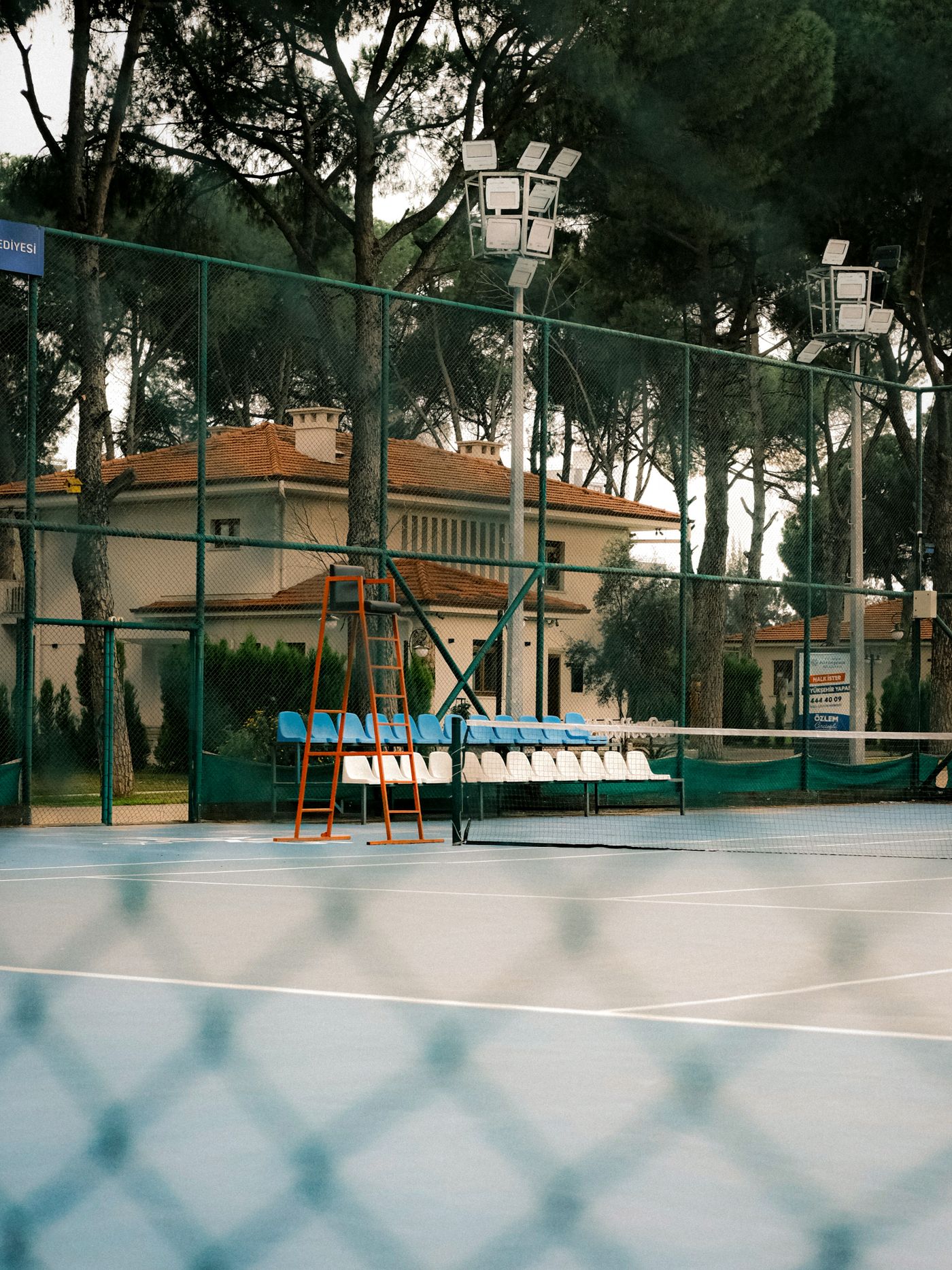 Courts at dusk before evening matches