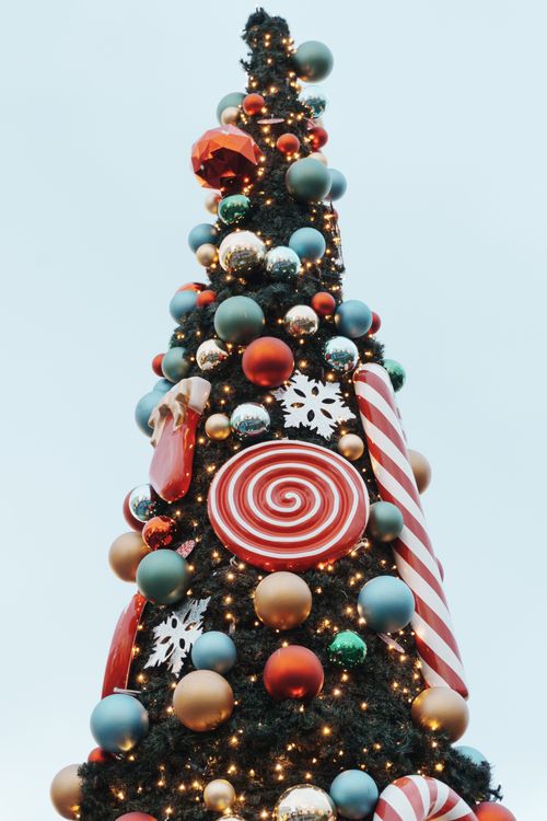 Free Colorful Christmas tree in Istanbul adorned with candy-themed decorations and lights. Stock Photo