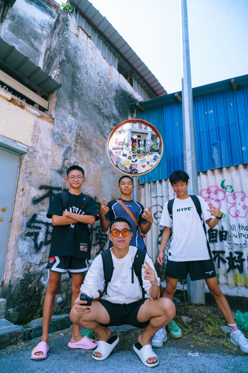 Street Group Group of Friends Posing in Urban Street Scene · Free Stock Photo