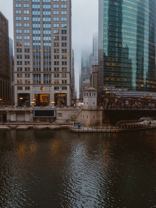 Free View of a city skyline and river in a foggy urban environment. Stock Photo