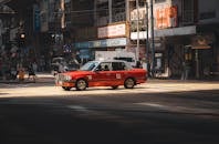 Red Taxi on Hong Kong Street at Daytime