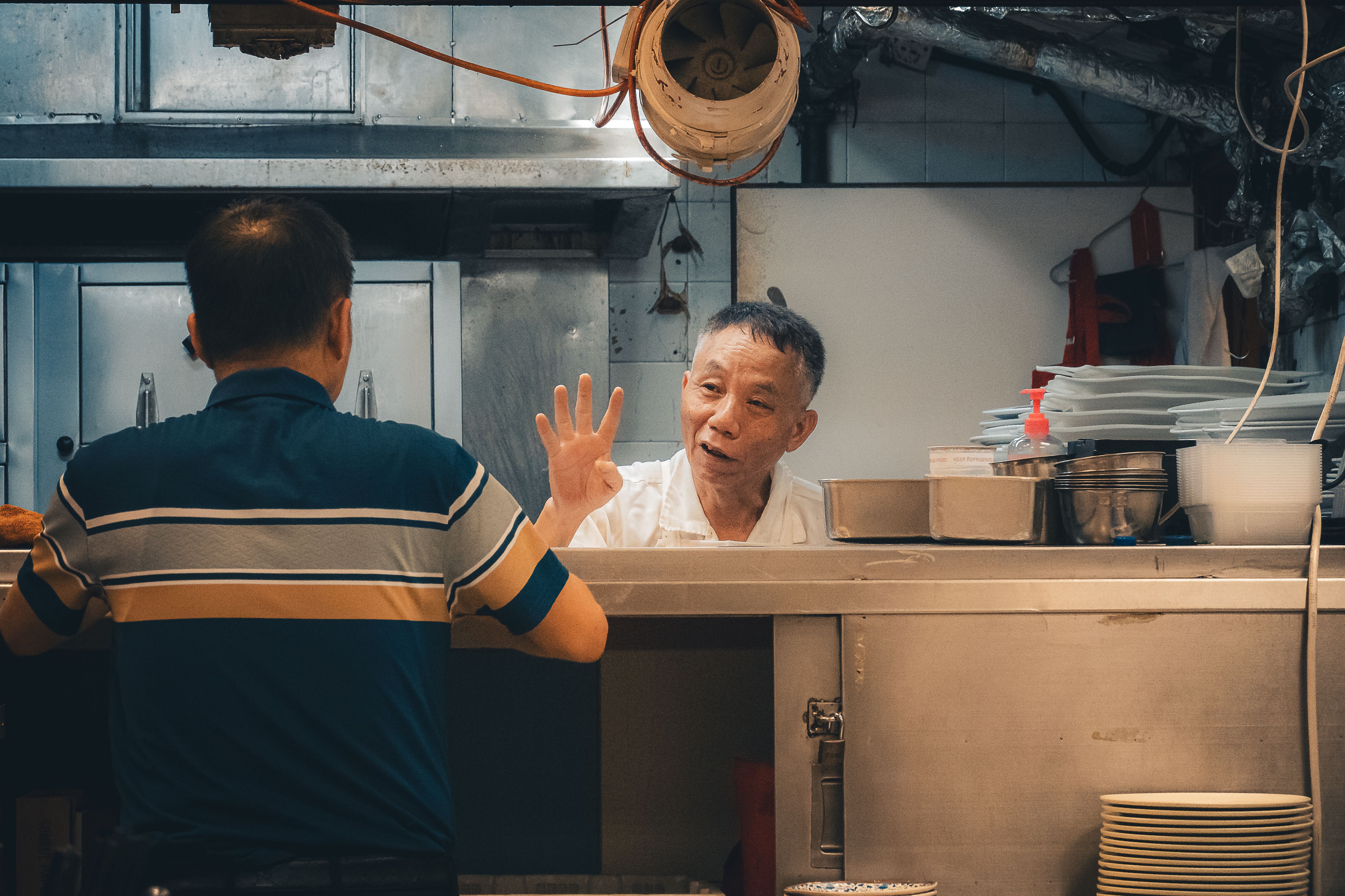 Cha Chaan Teng are Hong Kong's iconic local cafes - fast, cheap, and packed with unique East-West dishes. Here's what to order and how to handle the experience.