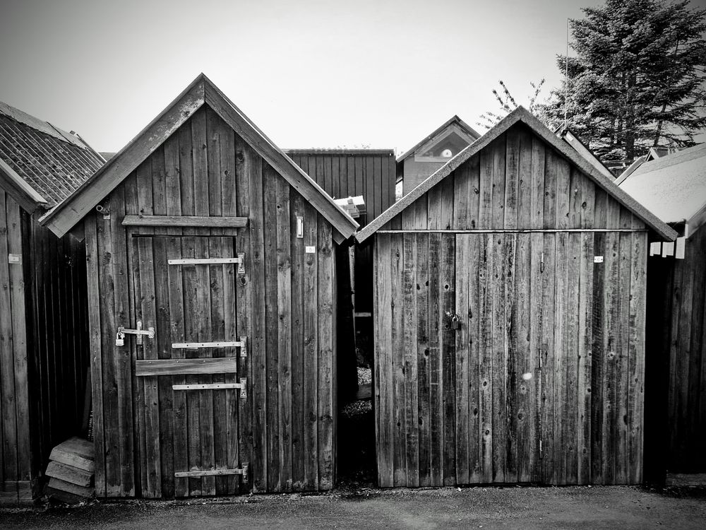 Rustic Wooden Sheds in Black and White · Free Stock Photo