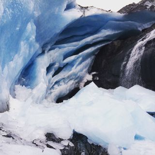 Photo by John Schaff on Pexels — a blue and white ice cave