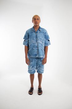 Model showcasing a modern denim outfit with a stylish design and relaxed fit.