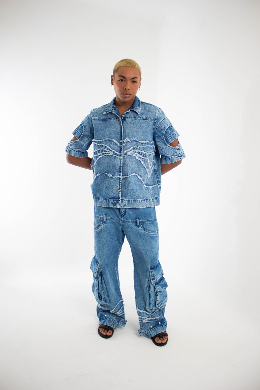 Full-length street portrait in a denim outfit &mdash; photo by Pietro Henricky on Pexels