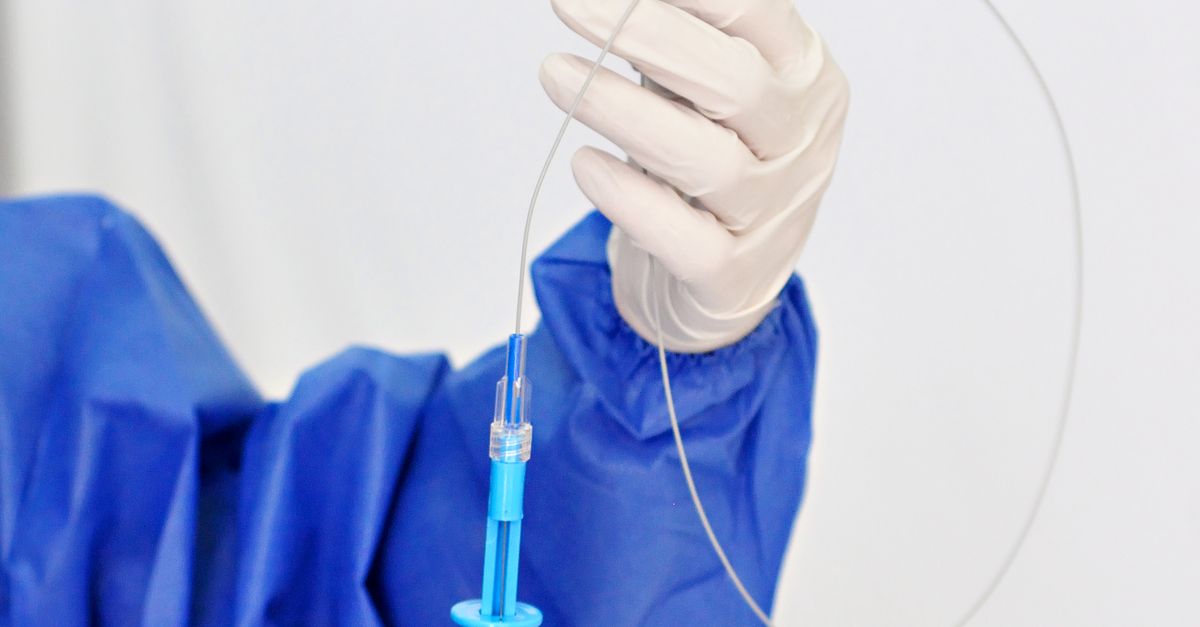 Medical Professional Handling a Surgical Instrument · Free Stock Photo