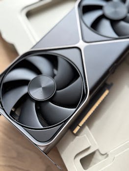 Detailed view of a high-performance GPU cooling fan in stylish black design.