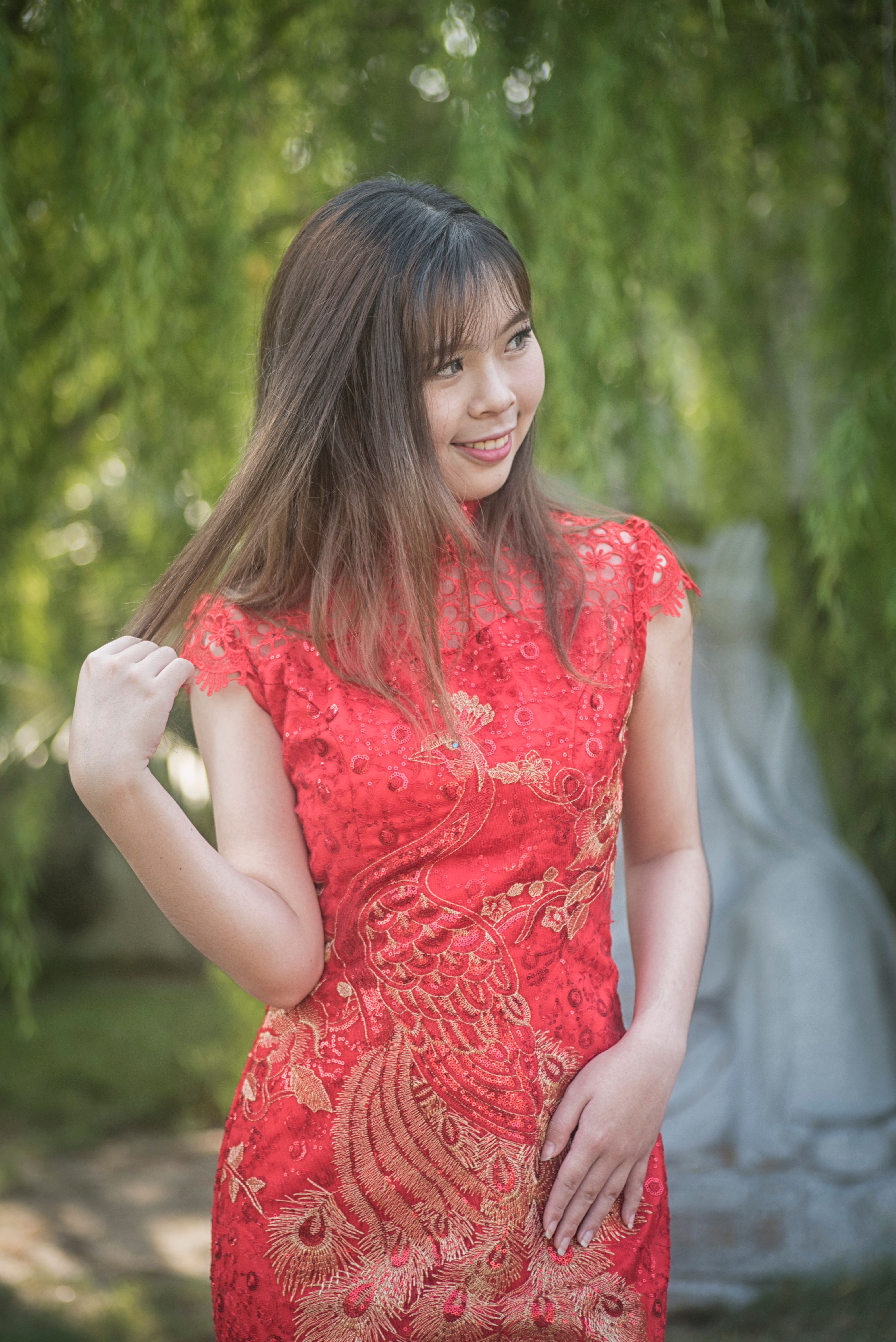 Woman in Red Traditional Dress Outdoors · Free Stock Photo
