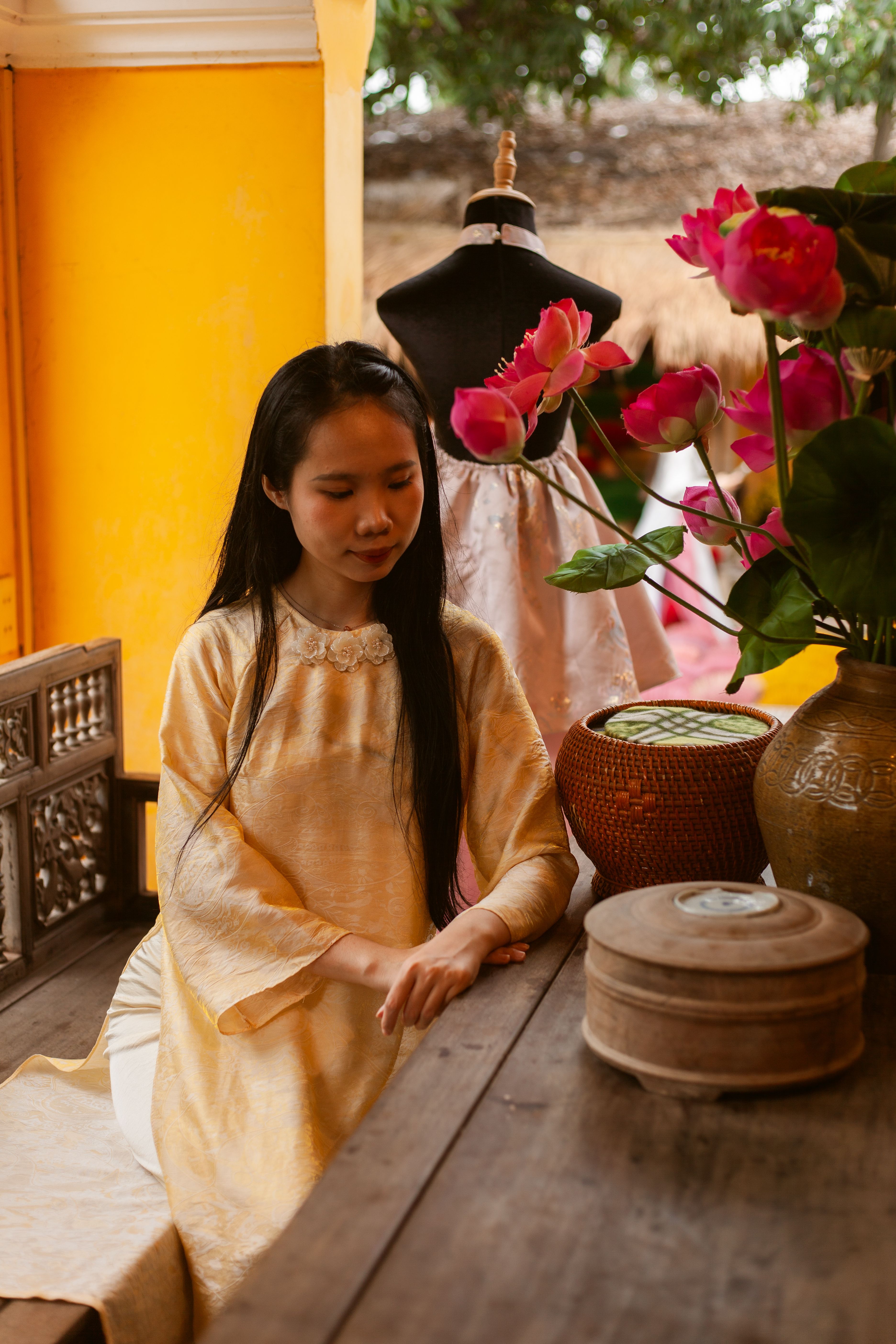 Elegant Woman in Traditional Yellow Dress Indoors · Free Stock Photo