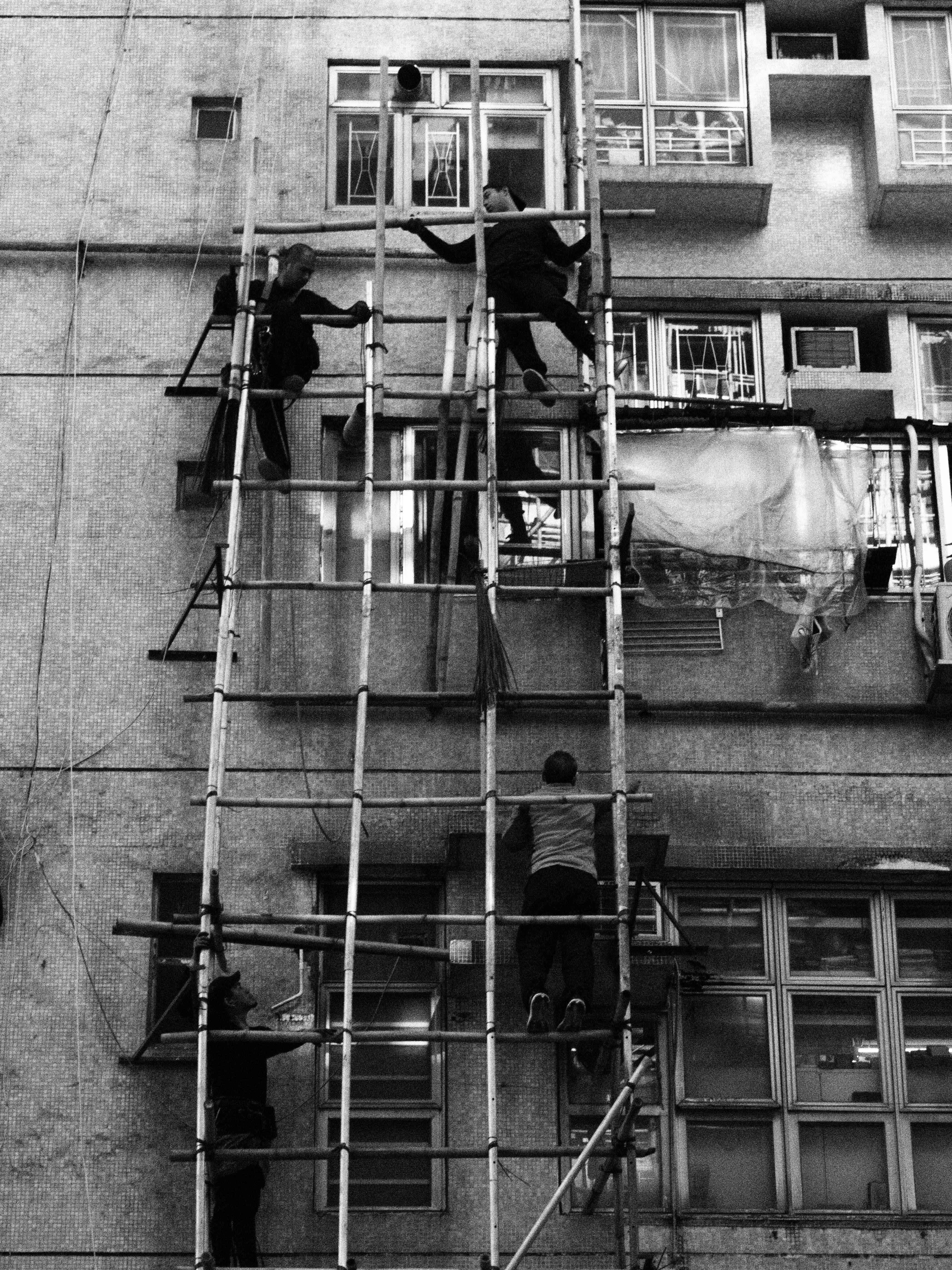 Construction Workers on Bamboo Scaffolding in Hong Kong