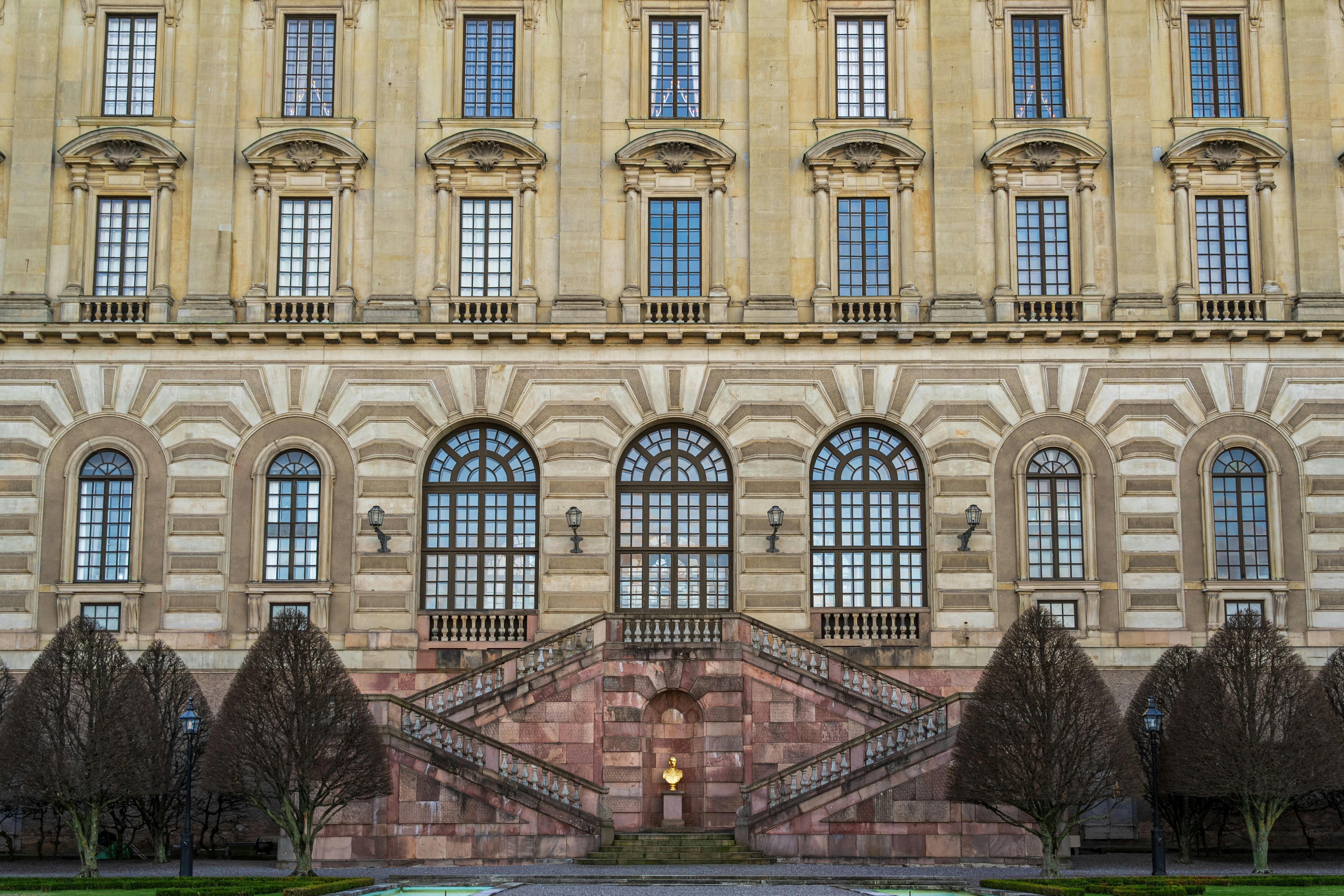 Exterior of the historic Royal Palace in Stockholm showcasing baroque architecture.