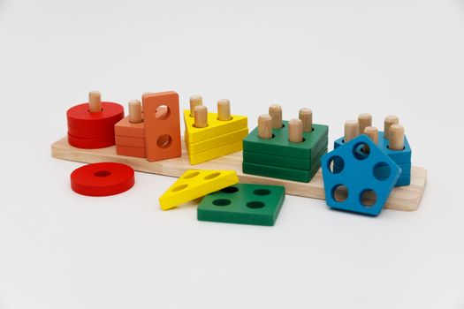 Brightly colored wooden stacking toy set ideal for children's educational play.