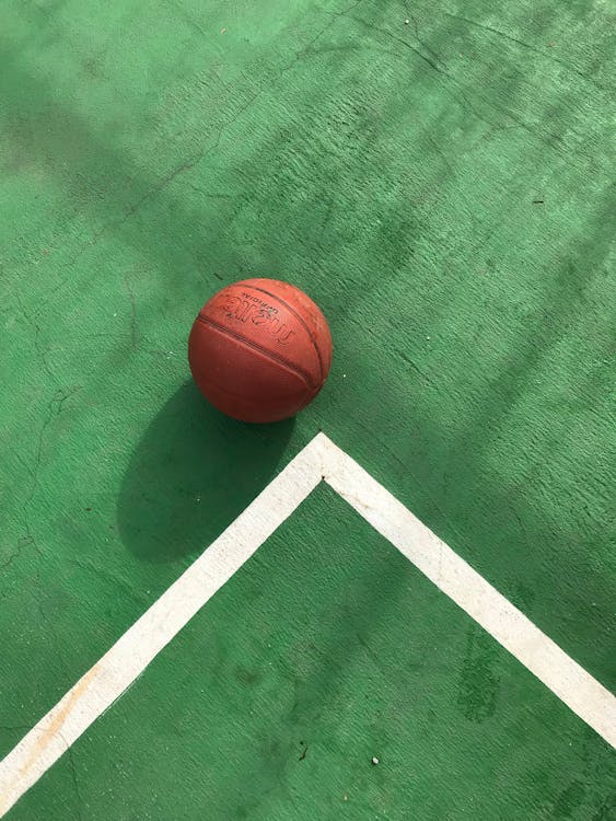 Free Photo of Basketball on Floor Stock Photo