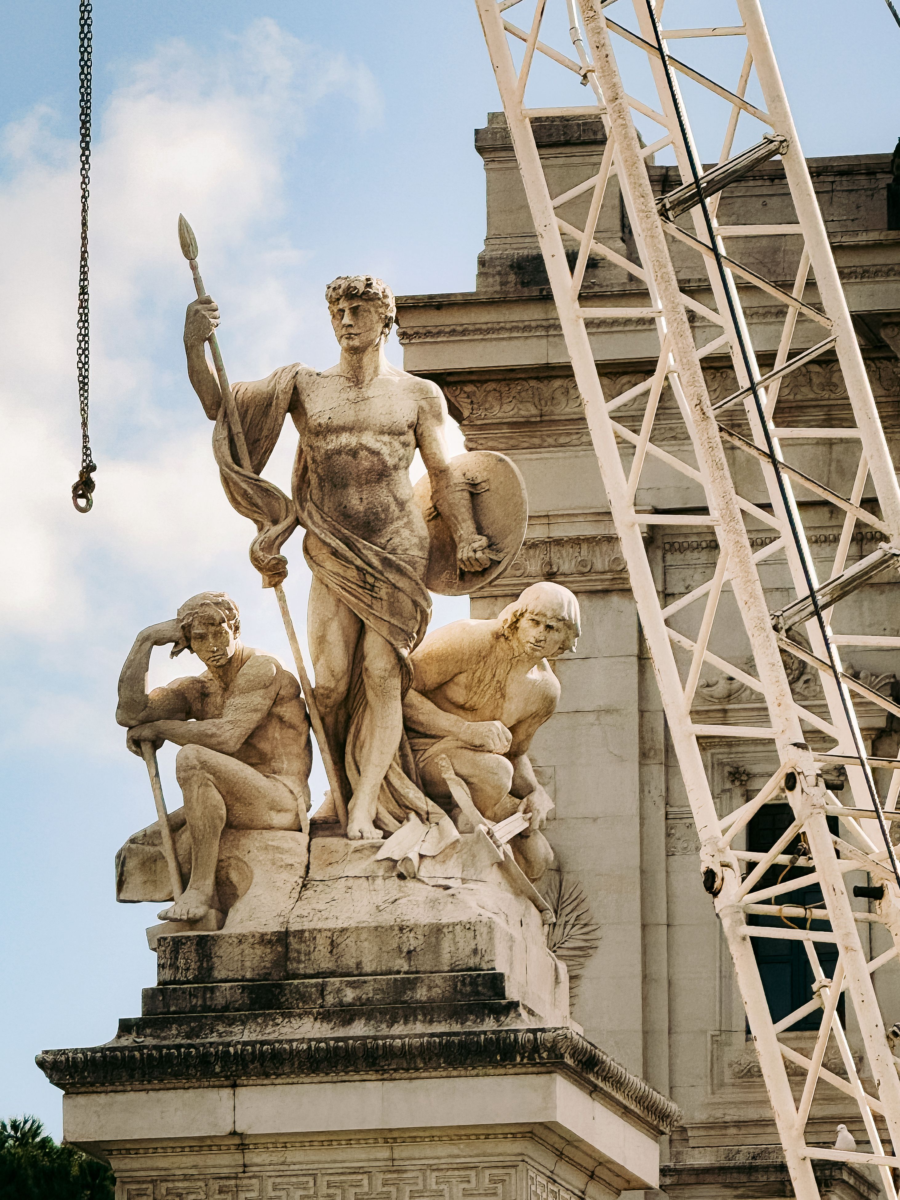 Statues in Rome with Crane in View · Free Stock Photo