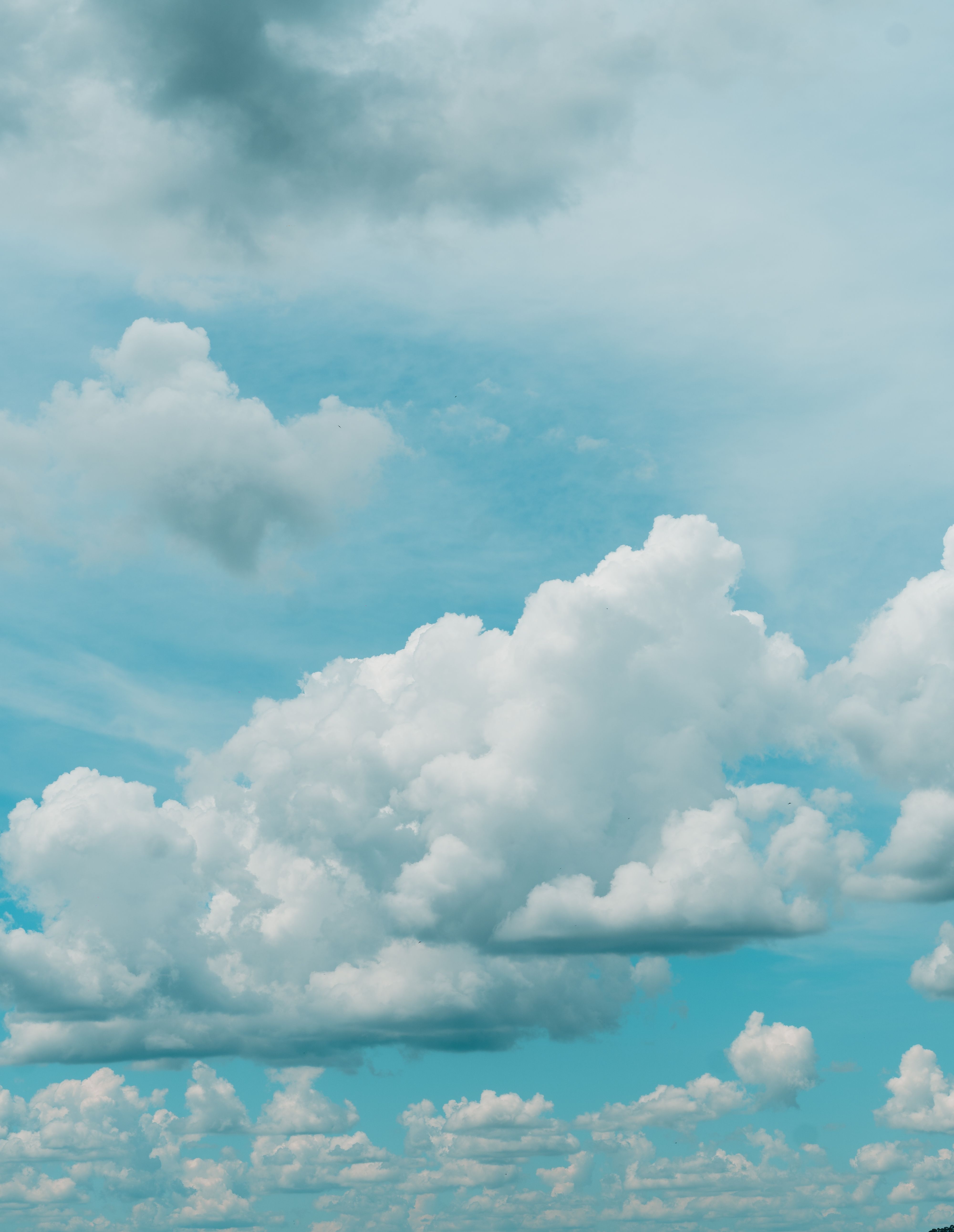 Serene Blue Sky with Fluffy White Clouds · Free Stock Photo