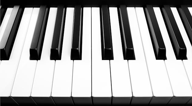 Minimalist black and white close-up of piano keys highlighting form and contrast.