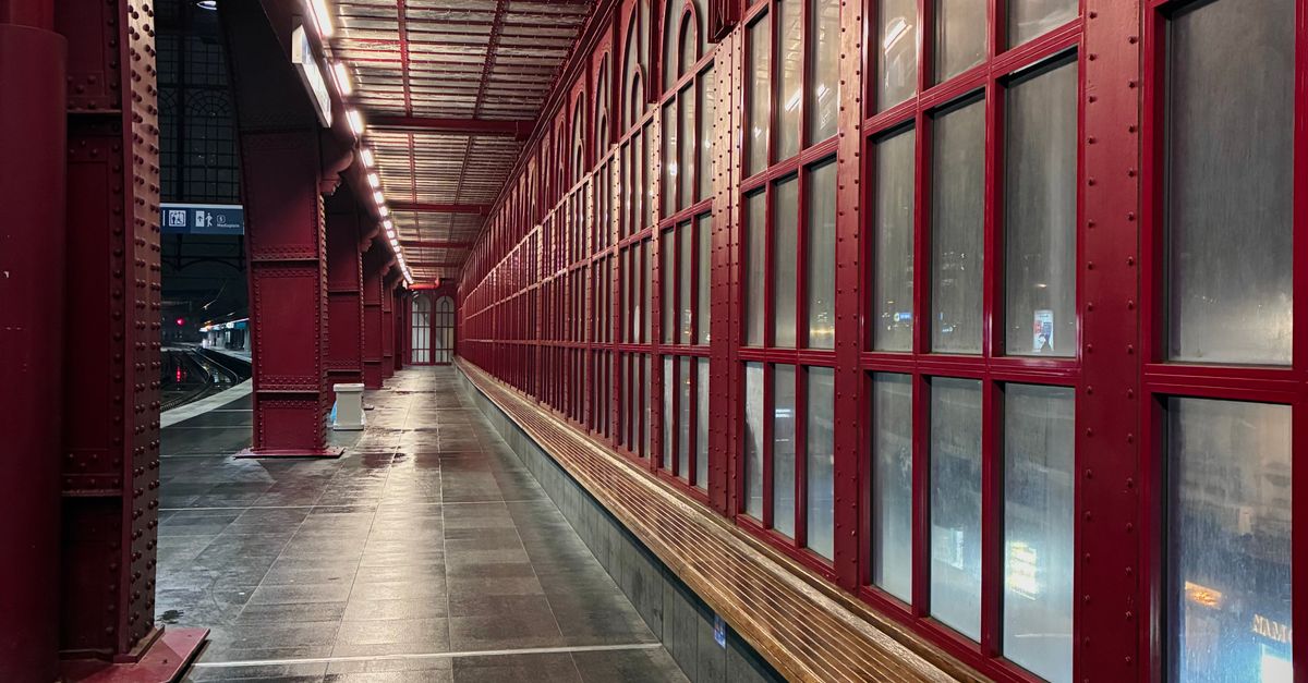 Arch Window Train Red Steel Train Station Corridor with Arched Windows · Free Stock Photo